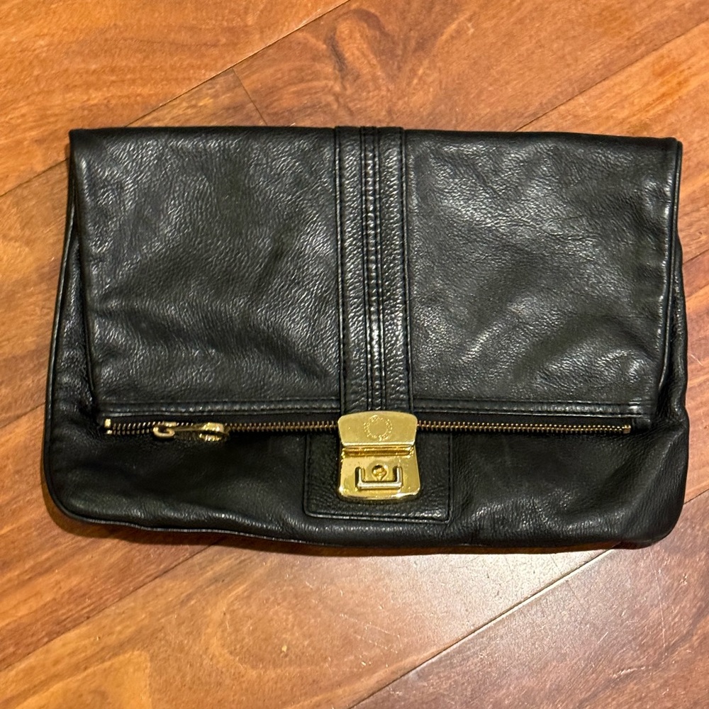 Marc by Marc Jabobs oversized clutch as seen on Lauren Conrad, fits a lot.
